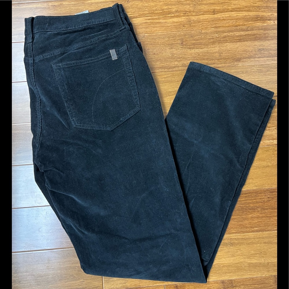 Joes jeans black corduroy, 98% cotton with 2% spandex to give a little stretch.